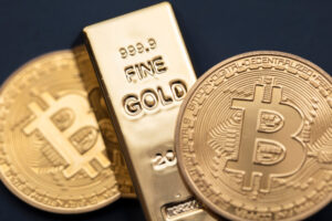 Bitcoin,Cryptocurrency,Coin,With,A,Gold,Bullion,Bar.,Investment,Concept